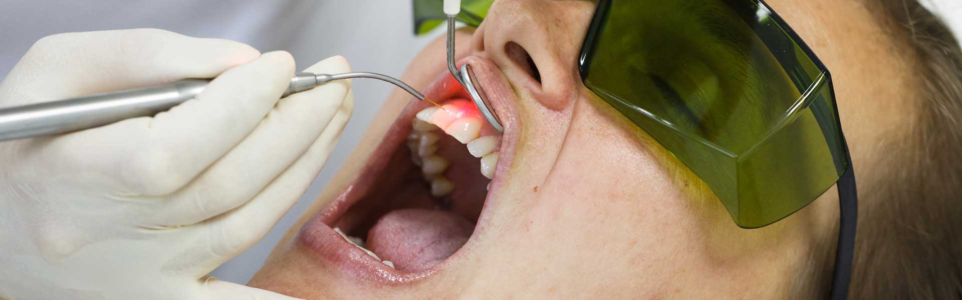 https://www.pathwaysdental.ca/wp-content/uploads/2020/09/ne-calgary-dental-laser-therapy-pathways-dental-clinic.jpg